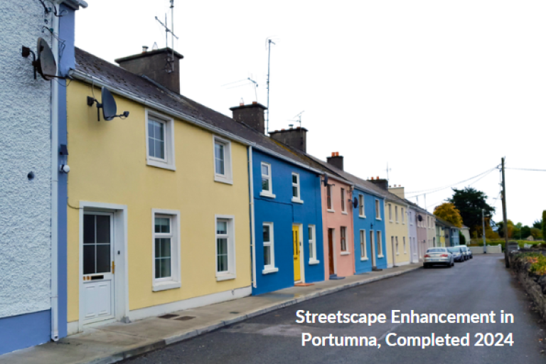 Row of terraced houses painted in bright colours