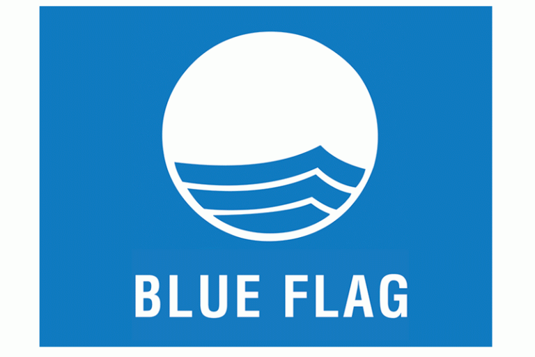 Blue Flag logo with circular wave design and text "BLUE FLAG" underneath.