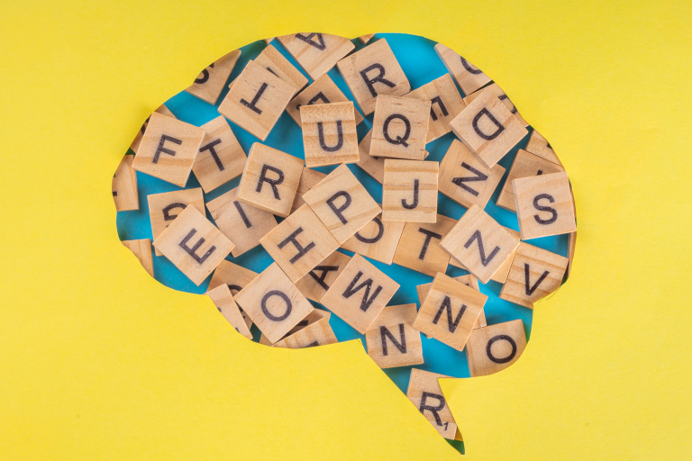 Image of letters within the frame of a brain