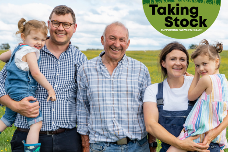 farmers family smiling with taking stock logo