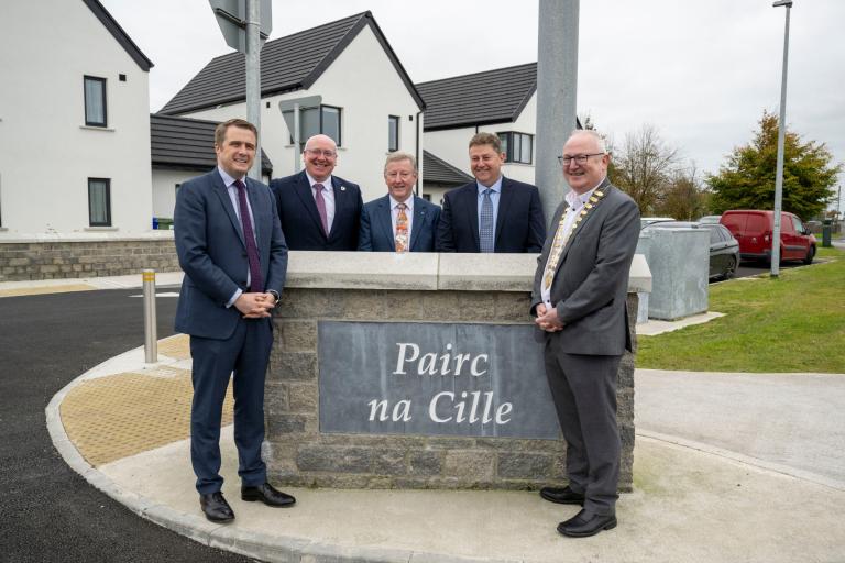 picture features the housing minister and elected members
