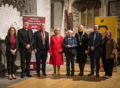 A photograph of attendees at St Nicholas Collegiate Church. From left to right: Lorna Baek, Alan Duggan, Andrew Reddington, Sabina Higgins, Michael D Higgins, Josie Forde, Leonard Cleary and Julie McHugh