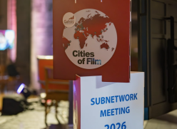 Cities of Film text on a red and white sign