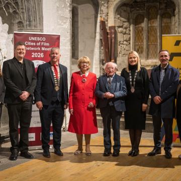 A photograph of attendees at St Nicholas Collegiate Church. From left to right: Lorna Baek, Alan Duggan, Andrew Reddington, Sabina Higgins, Michael D Higgins, Josie Forde, Leonard Cleary and Julie McHugh