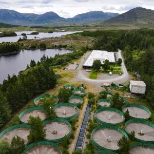 A photograph of an aerial view over Interface an ex salmon hatchery nestled in the hills of the Inagh Valley Conamara
