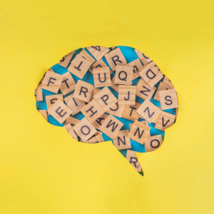 Image of letters within the frame of a brain