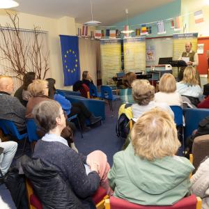 Image of crowd at event in library