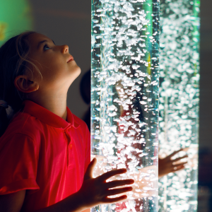 Image of girl with sensory light tube